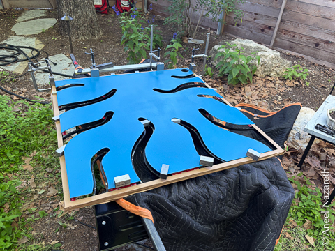 Magnetic shims placed around the edges of the frame